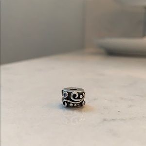 Pandora clip charm with scroll pattern and blue CZ